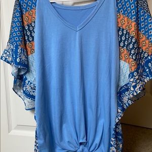 cute blue top with detailing